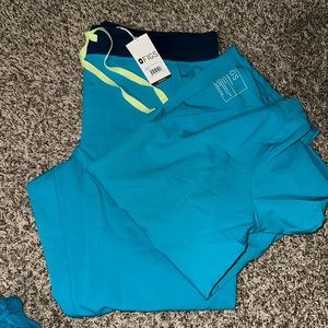 Figs brand new with tags Zamora and casma top both size large